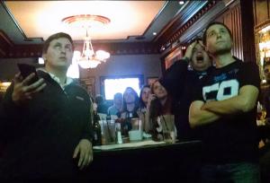 Fans showed concern as they watched the Panthers and Broncos at Ri-Ra on Tryon Street. (David Boraks/WFAE)
